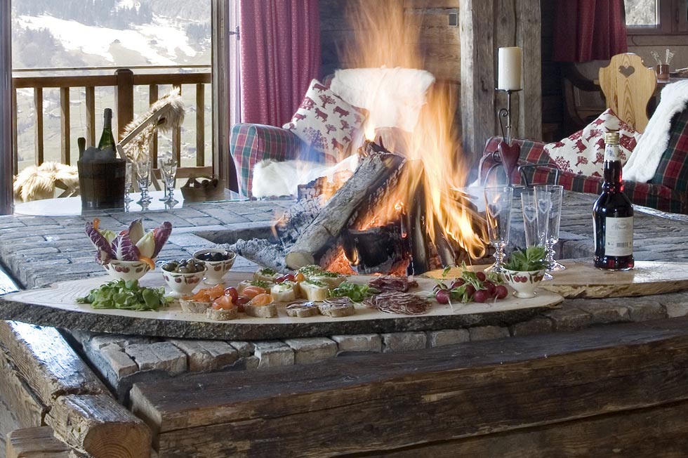 La Ferme du Soleil open fire with platter of canapés