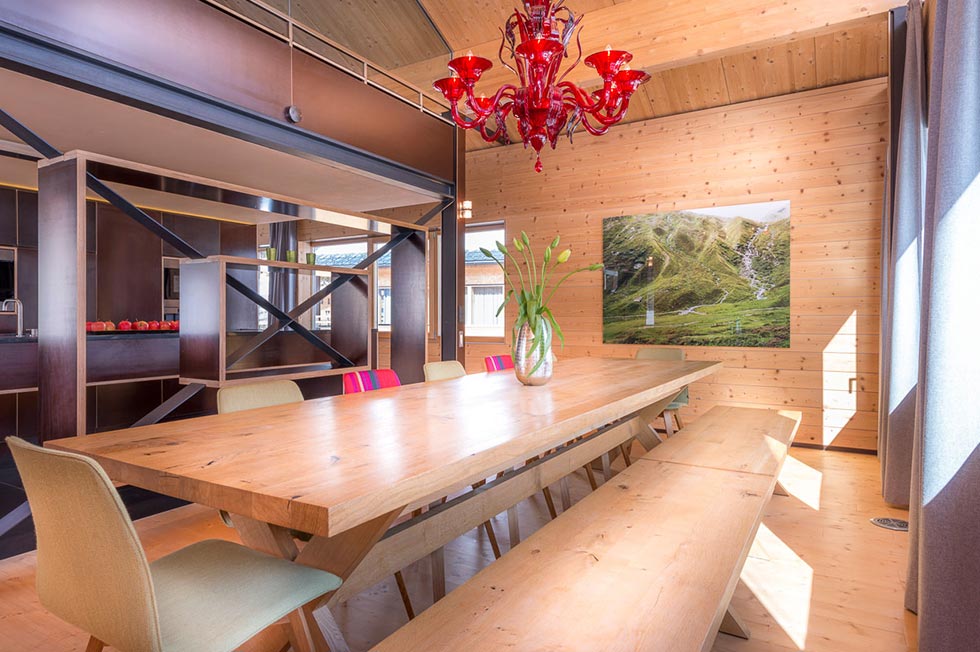 Chalet 685 dining table with red glass chandelier